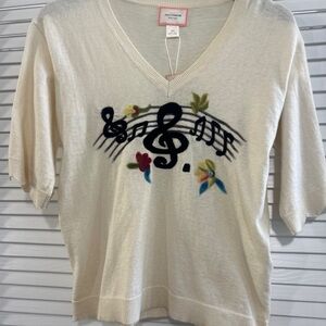 Ivory V-Neck Sweater with Musical Motif